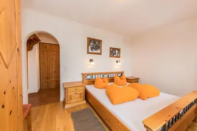 Ein Bett oder Betten in einem Zimmer der Unterkunft Ferienhof Leitengut