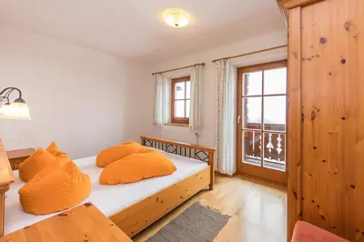 Ein Bett oder Betten in einem Zimmer der Unterkunft Ferienhof Leitengut