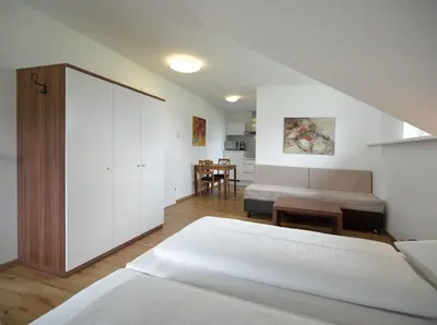 Ein Bett oder Betten in einem Zimmer der Unterkunft Aparthotel Fürst