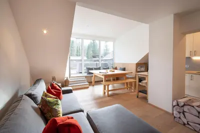 Ein Sitzbereich in der Unterkunft Bramsauerhof