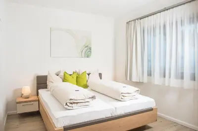 Ein Bett oder Betten in einem Zimmer der Unterkunft Villa Valentine