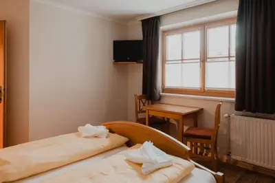 Ein Bett oder Betten in einem Zimmer der Unterkunft Kugellehen