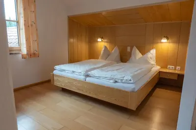 Ein Bett oder Betten in einem Zimmer der Unterkunft Frühstückspension Haus Mayr