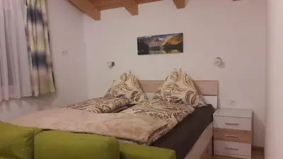 Ein Bett oder Betten in einem Zimmer der Unterkunft Chalet Sunnseitn