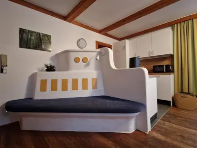 Ein Bett oder Betten in einem Zimmer der Unterkunft Kachelofenwohnung Pölzleitner