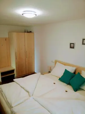 Ein Bett oder Betten in einem Zimmer der Unterkunft Panoramahof Manzberg