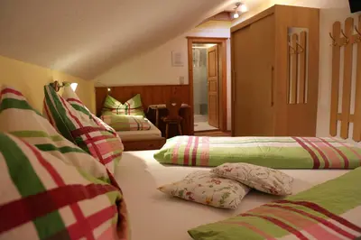 Ein Bett oder Betten in einem Zimmer der Unterkunft Haufhof-Pension am Bauernhof, Haus im Ennstal bei Schladming