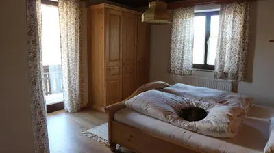 Ein Bett oder Betten in einem Zimmer der Unterkunft Haus Galler - Urlaub am Bauernhof