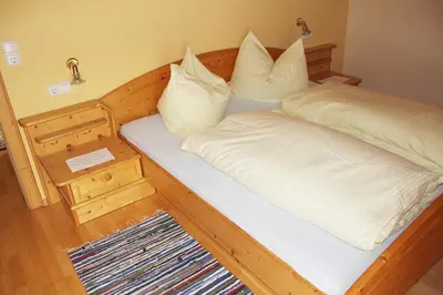 Ein Bett oder Betten in einem Zimmer der Unterkunft Bauernhof Trinkergut