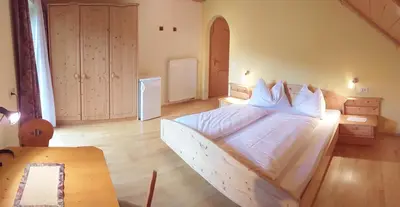 Ein Bett oder Betten in einem Zimmer der Unterkunft Bauernhof Trinkergut