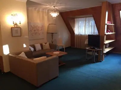 Ein Sitzbereich in der Unterkunft Landhotel Forsthof