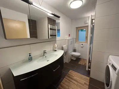 Ein Badezimmer in der Unterkunft Flatzerhof