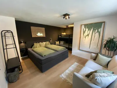 Ein Bett oder Betten in einem Zimmer der Unterkunft Tini House