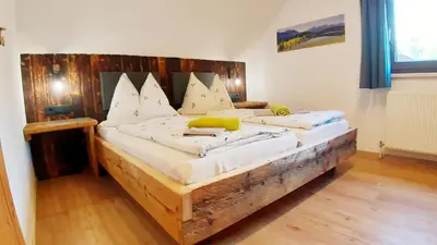 Ein Bett oder Betten in einem Zimmer der Unterkunft Schirfhof