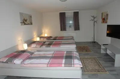Ein Bett oder Betten in einem Zimmer der Unterkunft Gästehaus Daniela