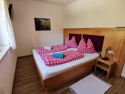 Ein Bett oder Betten in einem Zimmer der Unterkunft Brücklerhof