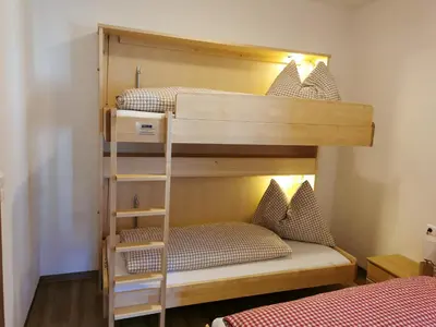 Ein Bett oder Betten in einem Zimmer der Unterkunft Brücklerhof