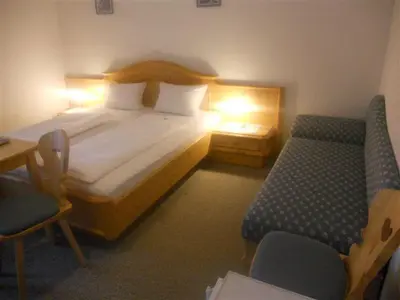 Ein Bett oder Betten in einem Zimmer der Unterkunft Haus Pürcher