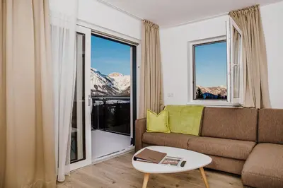 Ein Sitzbereich in der Unterkunft Appartements Almnest