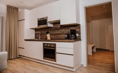 Küche/Küchenzeile in der Unterkunft Appartements Almnest