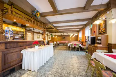Ein Restaurant oder anderes Speiselokal in der Unterkunft Frühstückspension Rötelstein