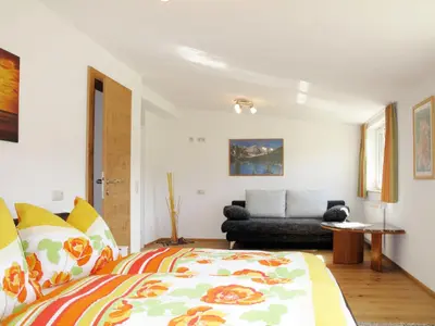 Ein Bett oder Betten in einem Zimmer der Unterkunft Apartment Lärche by Interhome