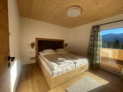 Ein Bett oder Betten in einem Zimmer der Unterkunft Ferienwohnungen Unterdürmoos Apartments mit Chalet-Charme auf 1050 m , Alleinlage