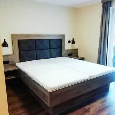 Ein Bett oder Betten in einem Zimmer der Unterkunft Die Reinbachstube