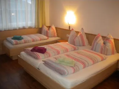 Ein Bett oder Betten in einem Zimmer der Unterkunft Appartement Andi