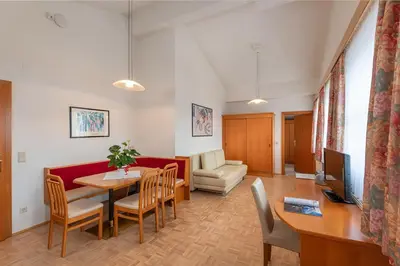 Ein Sitzbereich in der Unterkunft Dr. Aufmesser Appartements