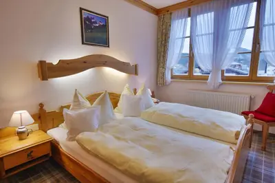 Ein Bett oder Betten in einem Zimmer der Unterkunft Appartementhaus Sonne