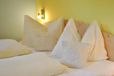 Ein Bett oder Betten in einem Zimmer der Unterkunft Gäste- und Seminarhaus Sölkstub'n