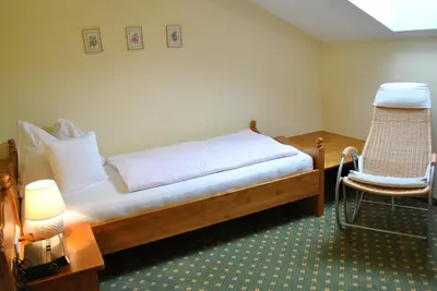 Ein Bett oder Betten in einem Zimmer der Unterkunft Gäste- und Seminarhaus Sölkstub'n