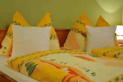 Ein Bett oder Betten in einem Zimmer der Unterkunft Gäste- und Seminarhaus Sölkstub'n