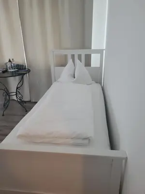 Ein Bett oder Betten in einem Zimmer der Unterkunft Märchenwald Steiermark Gasthof Sonnenhof