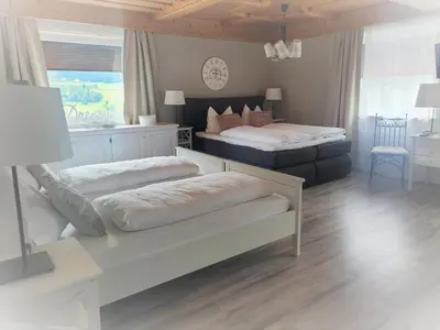 Ein Bett oder Betten in einem Zimmer der Unterkunft Märchenwald Steiermark Gasthof Sonnenhof