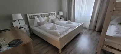 Ein Bett oder Betten in einem Zimmer der Unterkunft Märchenwald Steiermark Gasthof Sonnenhof