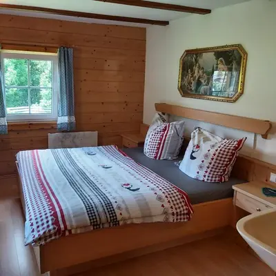 Ein Bett oder Betten in einem Zimmer der Unterkunft Haus Sonnenalm