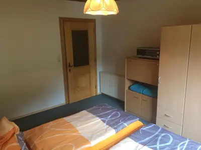 Ein Bett oder Betten in einem Zimmer der Unterkunft Ferienwohnung Susanne Hillbrand