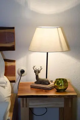 Ein Bett oder Betten in einem Zimmer der Unterkunft Ferienwohnung Alpenblick
