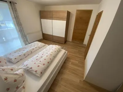 Ein Bett oder Betten in einem Zimmer der Unterkunft Leitenhof