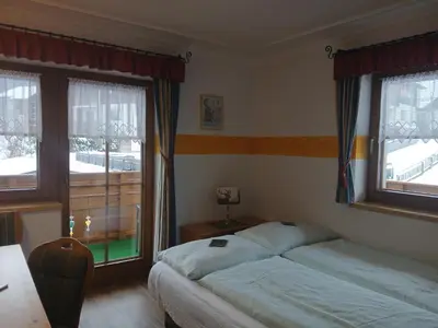 Ein Bett oder Betten in einem Zimmer der Unterkunft Alpenblick