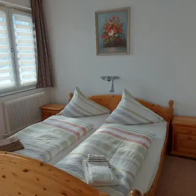 Ein Bett oder Betten in einem Zimmer der Unterkunft Haus Mundl