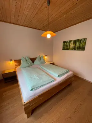 Ein Bett oder Betten in einem Zimmer der Unterkunft Ferienhaus Julia