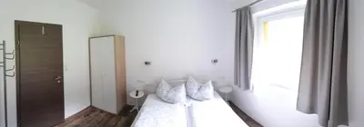 Ein Bett oder Betten in einem Zimmer der Unterkunft Ferienwohnung Alpklang