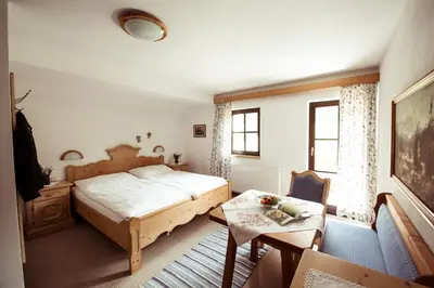 Ein Bett oder Betten in einem Zimmer der Unterkunft Frühstückspension Windlegern