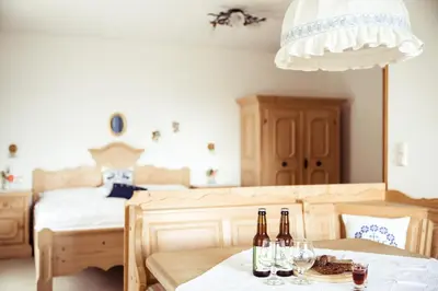 Ein Bett oder Betten in einem Zimmer der Unterkunft Frühstückspension Windlegern