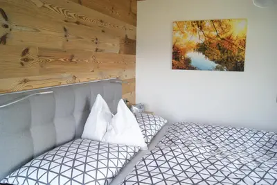 Ein Bett oder Betten in einem Zimmer der Unterkunft Steinerbauer