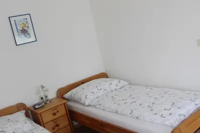 Ein Bett oder Betten in einem Zimmer der Unterkunft Haus Bruschek