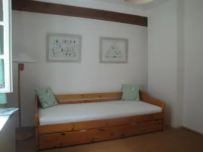 Ein Bett oder Betten in einem Zimmer der Unterkunft Jägerhaus